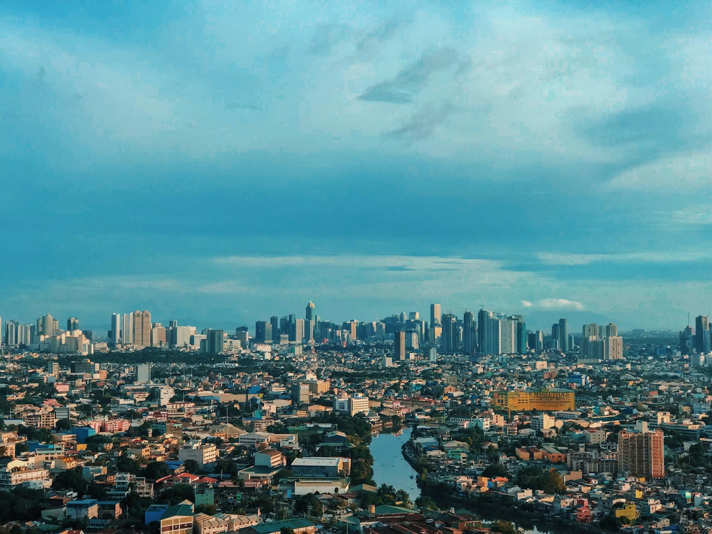 Manila skyline under a blue sky